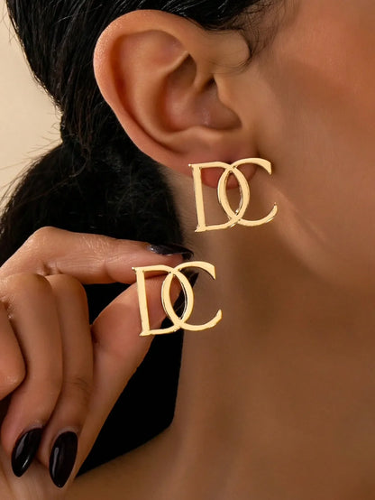 Shein - Gold DC Letter Stud Earrings