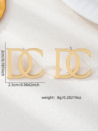 Shein - Gold DC Letter Stud Earrings