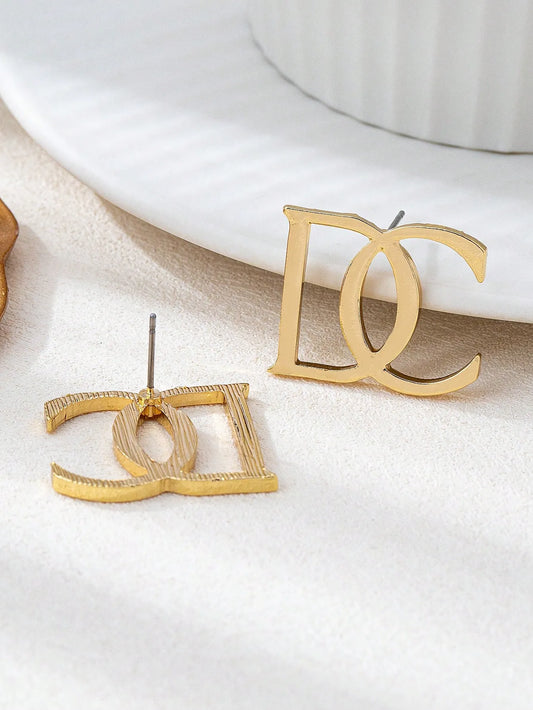 Shein - Gold DC Letter Stud Earrings